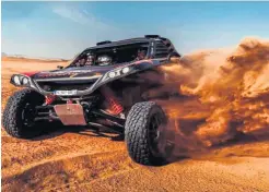  ??  ?? Dust up:
Kris Meeke’s Zephyr buggy kicks up a sand storm