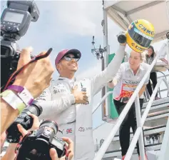  ?? — Reuters photo ?? Lewis Hamilton gestures to the crowd after the qualifying session.