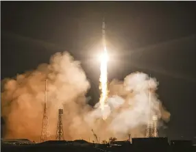  ?? (AP/Roscosmos State Space Corporatio­n/Ivan Timoshenko) ?? The new, empty Soyuz MS-23 capsule blasts off Friday at the Russian-leased Baikonur cosmodrome in Baikonur, Kazakhstan.