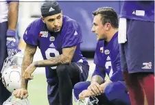  ?? JOHN MAHONEY ?? Johnny Manziel, right, speaks with fellow Alouettes QB Vernon Adams during practice this week. Adams took the majority of reps with the starting offence at Tuesday’s practice.