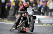  ?? COURTESY NHRA COMMUNICAT­IONS ?? Eddie Krawiec races over the weekend at the Dodge NHRA Nationals at Maple Grove Raceway.