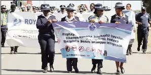  ?? (Courtesy pic) ?? Police officers during a crime preventon drive, including that of gender-based violence.