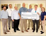  ?? Janelle Jessen/Herald-Leader ?? La-Z-Boy Foundation presented a check to the Siloam Springs Senior Activity and Wellness Center in the amount of $2,320 on Wednesday to be used for exercise equipment. Pictured are La-Z-Boy employees Jeff McGarrah, materials manager; Neil Erter,...