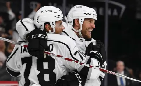  ?? ETHAN MILLER/GETTY IMAGES ?? Brooks Laich, right, celebratin­g an overtime goal in the pre-season, played his first NHL regular-season game in more than a year over the weekend.