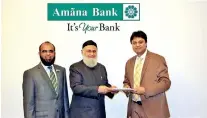  ??  ?? Amãna Bank Chairman Osman Kassim exchanging the IB Growth Fund investor agreement with Mohammed Ataur Rahman Chowdhury of ICD while the bank’s Chief Executive Officer Mohamed Azmeer looks on