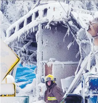  ?? RYA N R E MI O R Z / T H E C A NA D I A N P R E S S ?? A Quebec seniors’ home where a fire killed 32 people was not up to code, says a coroner’s report released last Thursday morning.