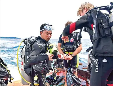  ?? SUPPLIED ?? Divers participat­e in the search for missing British backpacker Amelia Bambridge on Thursday, the day the 21-year-old’s remains were recovered from the sea some 50km from Koh Kong.