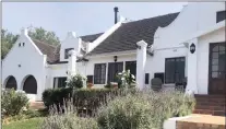  ??  ?? This newly renovated Cape Dutchstyle property, situated on a corner stand in an affluent Somerset West suburb, includes a well-appointed house with a guest wing, and its gardens are well-suited to withstand the Cape drought.
