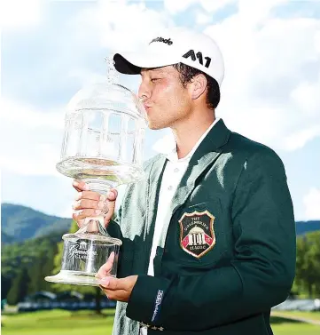  ??  ?? Xander Schauffele poses with the trophy after the final round of The Greenbrier Classic held at the Old White TPC on July 9, 2017 in White Sulphur Springs, West Virginia.