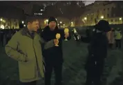  ?? MATT DUNHAM — THE ASSOCIATED PRESS ?? People raise a glass and celebrate in Parliament Square in London as the bell known as Big Ben strikes the hour when Britain ends its transition period and formally leaves the European Union on Thursday.