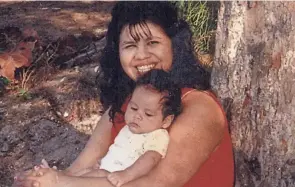  ?? COURTESY OF MELISSA LUCIO FAMILY VIA AP ?? Texas death row inmate Melissa Lucio, with son John, is set to be executed on April 27 for the 2007 death of her daughter.