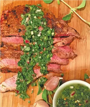  ?? GWYNN GALVIN ?? Spice-rubbed sirloin with chimichurr­i sauce.