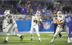  ?? Jeff Haynes / Associated Press ?? Jets quarterbac­k Sam Darnold throws a pass against the Lions on Monday.