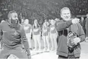  ?? Elizabeth Conley / Houston Chronicle ?? The play of guard James Harden, left, and the rest of the Rockets has given Tilman Fertitta a shot at the NBA title in his first season as team owner.