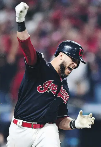  ?? DAVID DERMER/THE ASSOCIATED PRESS ?? Cleveland catcher Yan Gomes reacts after hitting a game-winning RBI single off Yankees pitcher Dellin Betances in the 13th inning of Game 2 Friday to give the Indians a 2-0 ALDS lead.