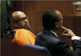  ?? GARY CORONADO — LOS ANGELES TIMES VIA AP ?? Former rap mogul Marion “Suge” Knight, left with his defense attorney Albert DeBlanc Jr., pleads no contest to voluntary manslaught­er Thursday after he ran over two men, killing one, nearly four years ago in Los Angeles Superior Court .