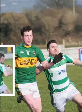  ??  ?? Dean McGreehan,Cooley Kickhams and Ben Rogan,O’Raghallaig­hs look to gain possession