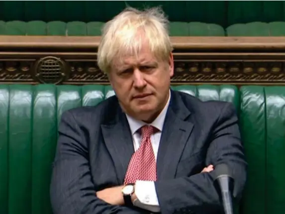  ?? (AFP) ?? Johnson in disdainful mode yesterday as Ed Milliband spoke