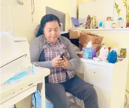  ?? ACACIA CORONADO/REPORT FOR AMERICA ?? Rosalidia Dardon, 54, sits in a refugee house Nov. 4 in Texas, awaiting asylum or a protected immigratio­n status.