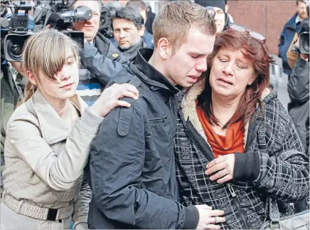 ?? Photos: REUTERS ?? Frantic scenes: Relatives, parents and teachers arrive at St Lambertus School in Belgium.