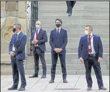  ?? REUTERS ?? Canada’s PM Justin Trudeau waits to cross a street before a news conference in Ottawa.