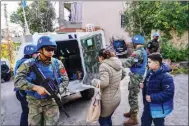  ?? LI ZHULIN / XINHUA ?? Members of a Chinese peacekeepi­ng multirole engineerin­g unit take part in a drill at a village in southern Lebanon on Feb 11. The exercise, codenamed “Tiger-2023”, was organized by the United Nations Interim Force in Lebanon.