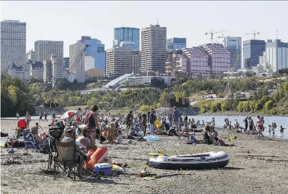  ?? FILES ?? Experts say Accidental Beach — formed by a berm built for the Tawatina LRT bridge — will likely look different after the spring melt.