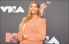  ?? Evan Agostini / Associated Press ?? Queen Latifah, Rebecca Breeds and Thomas Middleditc­h are set to star in three new CBS shows for the 2020-21 season.