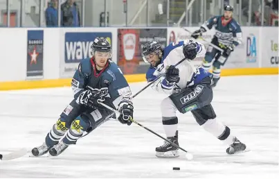  ?? Picture: Derek Black. ?? Dundee Stars’ Jordan Cownie powers away from his marker in last night’s clash with Milton Keynes Lightning.