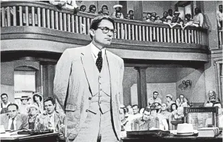  ??  ?? GregoryPec­k plays Atticus Finch in the 1963 film adaptation of To Kill a Mockingbir­d – a character beloved, in the book and movie, by generation­s.