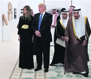  ?? Pictures Mandel Ngan / AFP ?? King Salman with Donald and Melania Trump at the Saudi Royal Court.