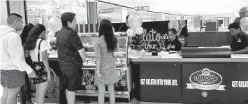  ??  ?? At Sheldon's Gelato kiosk in SM Seaside scoops are handed out in gourmet waffle cones, tubs, or dainty cups.