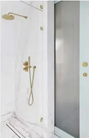  ??  ?? RIGHT: Lending colour and elegance, a brass-finished shower set picks up on similarly toned hardware throughout the space
(all from Livinghous­e).