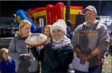  ?? SUBMITTED PHOTO ?? Emily Egan with a souvenir football.