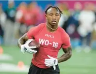  ?? MICHAEL CONROY/AP ?? Boston College wide receiver Zay Flowers runs a drill Saturday at the NFL scouting combine in Indianapol­is.