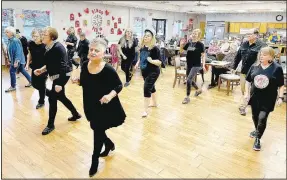  ?? (NWA Democrat-Gazette/Lynn Kutter) ?? Senior adults who have been participat­ing in the line dancing class at the Farmington Senior Activity and Wellness Center gave a recital during a recent Wednesday morning for others at the center and invited them to try it out.