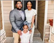  ?? COURTESY ?? In a recent photo, Newnan native Qualin Campbell stands with his wife, Tali’ja, and their younger daughter, age 4. Campbell was taken hostage, shot and killed June 2 in Colorado Springs; no motive is known.