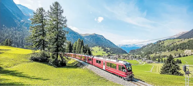  ?? DPA-BILD: Andrea Badrutt/Rhätische Bahn ?? Die Albula-Linie der Rhätischen Bahn gehört zum Unesco-Weltkultur­erbe.