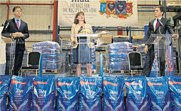  ??  ?? David Miliband, far right, with former Lib Dem leader Sir Nick Clegg and Nicky Morgan MP, at a rice factory in Rainham, Essex, yesterday. He denied plans for a new centrist party similar to the SDP, right, in 1981