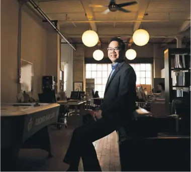  ?? AARON LYNETT / NATIONAL POST ?? Rubsun Ho poses in the offices of his low-key law firm, Cognition, which looks more like a tech startup
than a legal headquarte­rs on first viewing. Mitch Kowalski thinks this is the law firm of the future.