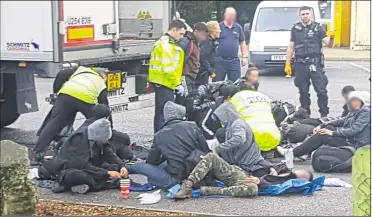  ?? Picture: Sean Briggs ?? Police at Maidstone Services. A total of 23 men were found and are being interviewe­d by immigratio­n officials