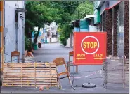  ?? (AP/Hau Dinh) ?? A street is blocked Sept. 13 during a virus lockdown.