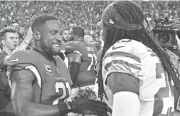  ??  ?? Cardinals cornerback Patrick Peterson (left) talks with San Francisco 49ers cornerback Richard Sherman after the game at State Farm Stadium on Oct. 28.