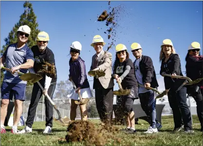  ?? PHOTOS BY SHAE HAMMOND — STAFF PHOTOGRAPH­ER ?? Morgan Hill Mayor Mark Turner, center, participat­es in a groundbrea­king ceremony for a new pickleball court in Morgan Hill on Friday.