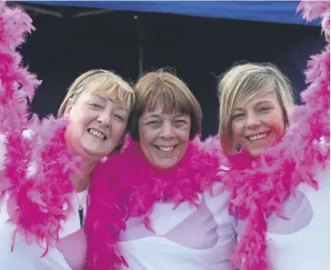  ?? ?? Keen charity supporter Gaynor, on the right, taking part in the Halifax Race For Life at Savile Park back in 2011.