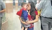  ?? AFP ?? A woman reunited with her son in El Paso, Texas.