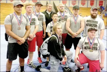  ?? PHOTO SUBMITTED ?? McDonald County High School finished ninth out of 15 teams at the Missouri State Powerlifti­ng Championsh­ips held Saturday at Glendale High School in Springfiel­d. Front row from left: Marshall Foreman and Nolen Baisch. Middle row from left: Erin Yang,...