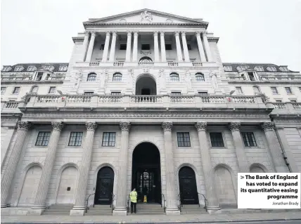  ?? Jonathan Brady ?? > The Bank of England has voted to expand its quantitati­ve easing programme