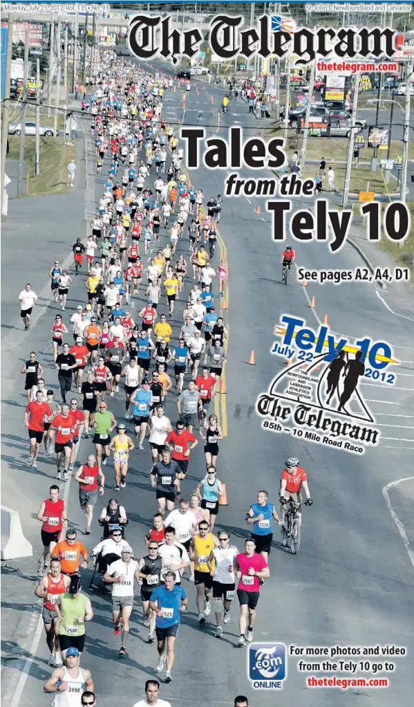  ?? — Photo by Gary Hebbard/the Telegram ?? The pack passes through Paradise as they head toward the Kenmount Road overpass.