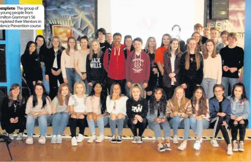  ??  ?? Complete The group of 40 young people from Hamilton Grammar’s S6 completed their Mentors in Violence Prevention course